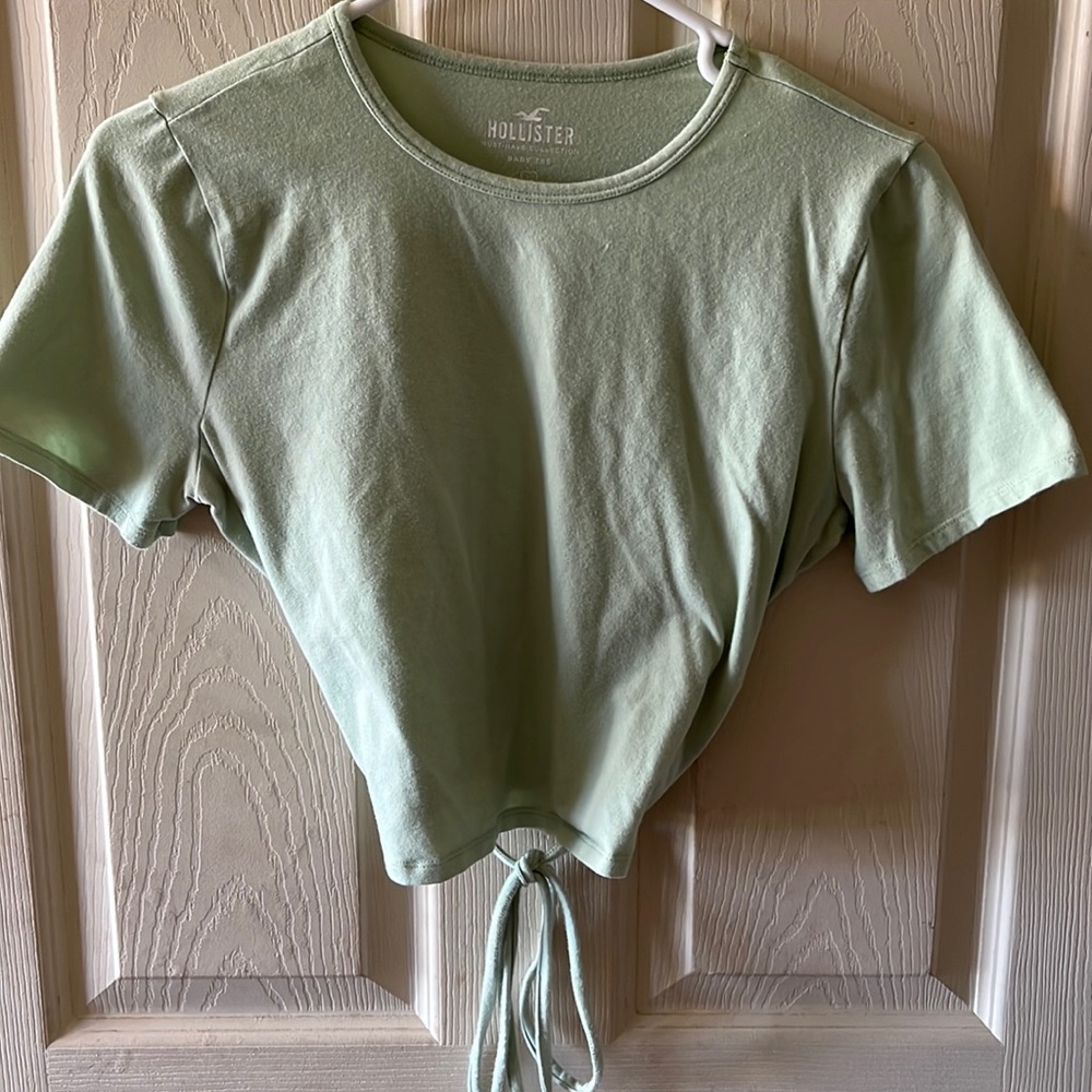 Green Hollister cropped baby tee